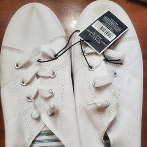 Ladies' white laced up West Loop sneakers. Each $10.00.